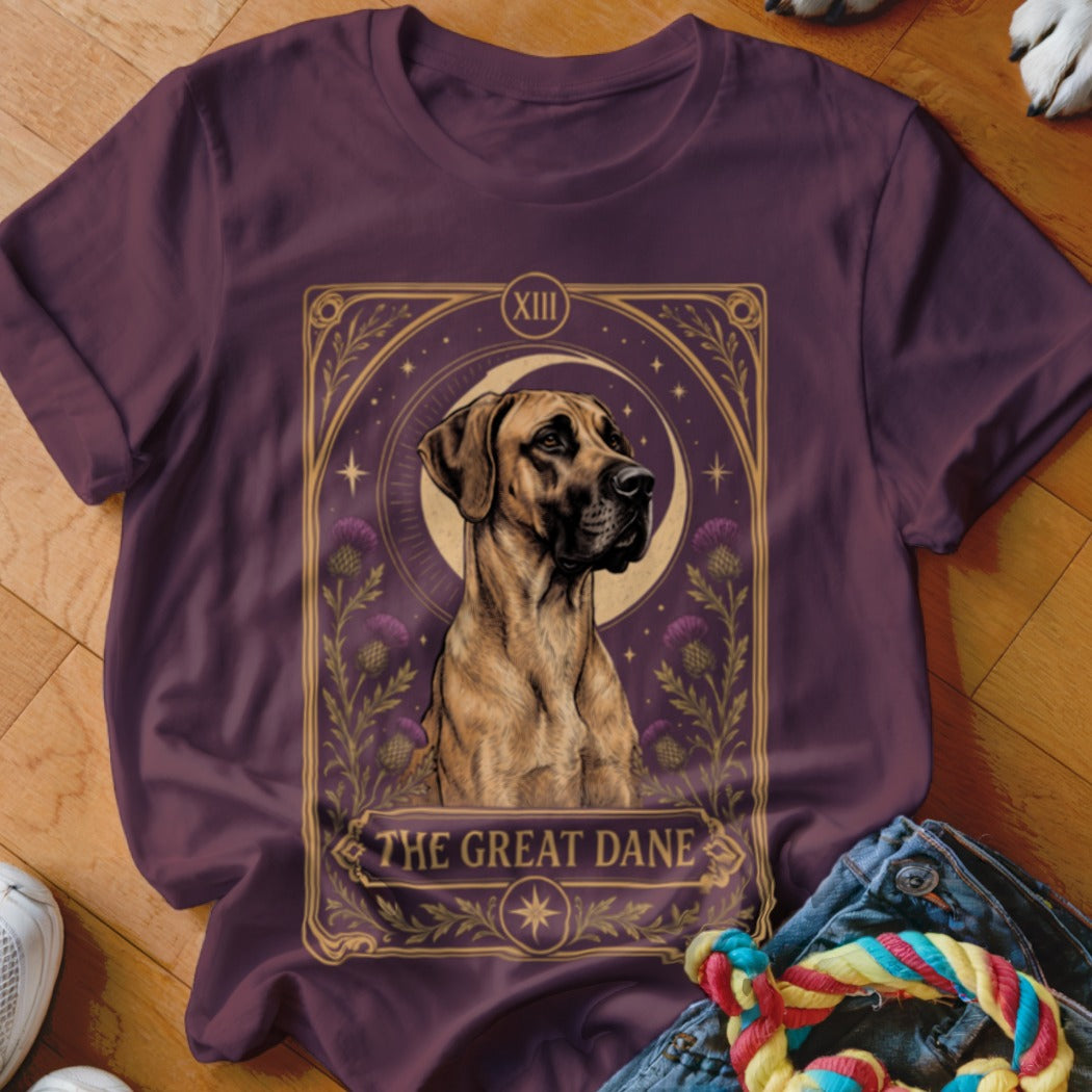 A dark purple t-shirt featuring a tarot card design centered with a fawn Great Dane.