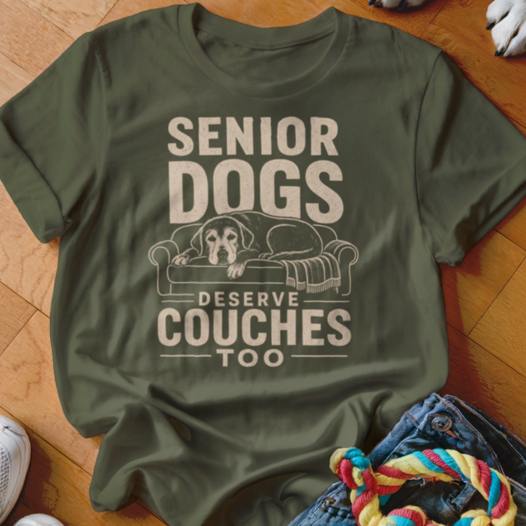 Olive t-shirt with "Senior Dogs Deserve Couches Too" text and dog on couch graphic.