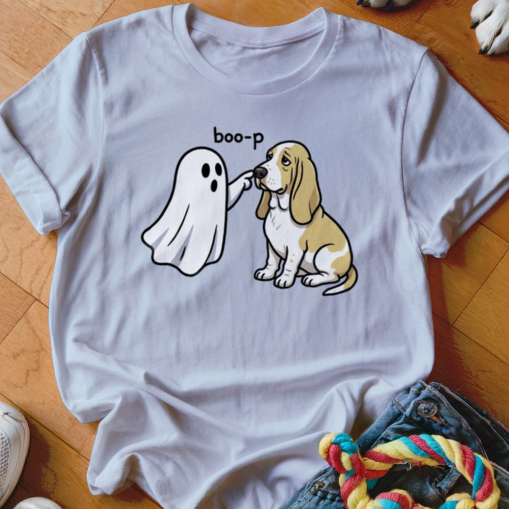 White t-shirt with illustration of a ghost booping a sad Basset Hound.