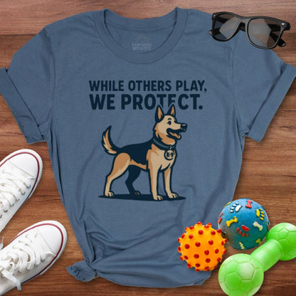 While Others Play Shirt - The Pawsitive Initiative